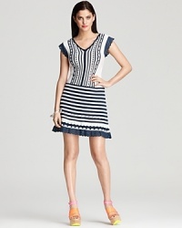 An eyelet Nanette Lepore dress lifts your look with easy elegance, featuring a chic ruffle through the front and dainty cap sleeves. For work or weekends, this look is sublime. An eyelet Nanette Lepore dress lifts your look with easy elegance, featuring a chic ruffle through the front and dainty cap sleeves. For work or weekends, this look is sublime.