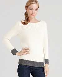 This lush Tegan sweater feels as soft as it looks and flaunts the color blocked trend of the season. This lush Tegan sweater feels as soft as it looks and flaunts the color blocked trend of the season.