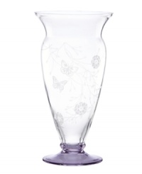 Etched with butterflies and blooms, this Butterfly Meadow vase by Lenox gives casual settings a whimsical lift. A tinted purple base adds a splash of color to luminous crystal. Etched with butterflies and blooms, this Butterfly Meadow vase by Lenox gives casual settings a whimsical lift. A tinted purple base adds a splash of color to luminous crystal.