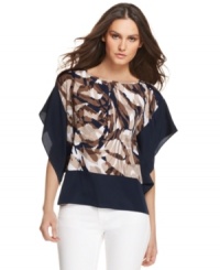 MICHAEL Michael Kors' kimono-sleeved petite top is stylishly striking with a printed center and solid sleeves and hemline. Pair with white pants to make the effect even more dramatic. MICHAEL Michael Kors' kimono-sleeved petite top is stylishly striking with a printed center and solid sleeves and hemline. Pair with white pants to make the effect even more dramatic.