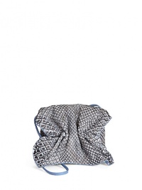 THE LOOKCrossbody strapCinched flapMagnetic tab closure under flapDrawstring topInside logo detailTHE MEASUREMENTCrossbody strap, 32 drop5W X 4H X 2½DTHE MATERIALPythonLeather and printed fabric liningORIGINMade in USA THE LOOKCrossbody strapCinched flapMagnetic tab closure under flapDrawstring topInside logo detailTHE MEASUREMENTCrossbody strap, 32 drop5W X 4H X 2½DTHE MATERIALPythonLeather and printed fabric liningORIGINMade in USA