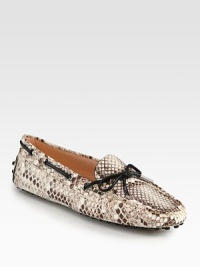 Handcrafted in Italy, this casual favorite takes on exotic appeal in genuine python. Python with lace detailLeather liningRubber solePadded insoleMade in Italy Handcrafted in Italy, this casual favorite takes on exotic appeal in genuine python. Python with lace detailLeather liningRubber solePadded insoleMade in Italy