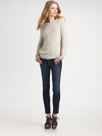 Pearlized beads stud this chic boatneck pullover crafted from a lush alpaca and wool knit.BoatneckDropped shouldersLong sleevesRibbed trimAbout 25 from shoulder to hem40% alpaca/40% wool/20% nylonDry cleanImportedModel shown is 5'10 (177cm) wearing US size 4.