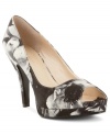 Expand your wardrobe with the perfectly poised and always versatile Danee peep-toe pumps by Nine West.