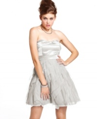 Asymmetrical tiers of glittery tulle add youthful style to this fun a-line party dress from Hailey Logan! Asymmetrical tiers of glittery tulle add youthful style to this fun a-line party dress from Hailey Logan!