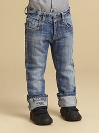 Slightly faded, subtly distressed and whiskered, with logo cuffs in a slim-fitting silhouette.Front button closureWaistband with belt loopsZip flyFive-pocket styleCottonDry cleanImported Slightly faded, subtly distressed and whiskered, with logo cuffs in a slim-fitting silhouette.Front button closureWaistband with belt loopsZip flyFive-pocket styleCottonDry cleanImported