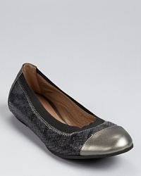 A metallic cap toe tops off a lizard-embossed silhouette from Bruno Magli. A metallic cap toe tops off a lizard-embossed silhouette from Bruno Magli.