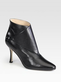 A cross-over panel secured by a chic button adds fashionable style to this slick leather design. Self-covered heel, 3½ (90mm)Leather upperButton closureLeather lining and solePadded insoleMade in ItalyOUR FIT MODEL RECOMMENDS ordering true size. A cross-over panel secured by a chic button adds fashionable style to this slick leather design. Self-covered heel, 3½ (90mm)Leather upperButton closureLeather lining and solePadded insoleMade in ItalyOUR FIT MODEL RECOMMENDS ordering true size.