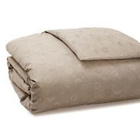 Inspired by the cascading flora of the South Pacific, the richly textured jacquard print on this Calvin Klein duvet infuses your boudoir with four-season elegance. Inspired by the cascading flora of the South Pacific, the richly textured jacquard print on this Calvin Klein duvet infuses your boudoir with four-season elegance.