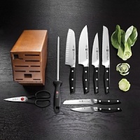 Practically everything is here, but the kitchen sink. Designed exclusively by Matteo Thun, this gorgeous cutlery is precision forged from a single piece of ice-hardened stainless steel with a unique wedge-shaped blade that gives you optimum stability. The triple-riveted, full-tang handles have a dynamic design that fit neatly in your hand. Set includes: 4 paring/utility, 5 serrated utility, 6 slicing, 7 hollow ground santoku, 8 chef's, 8 bread, 9 sharpening steel, kitchen shears & wood block. Practically everything is here, but the kitchen sink. Designed exclusively by Matteo Thun, this gorgeous cutlery is precision forged from a single piece of ice-hardened stainless steel with a unique wedge-shaped blade that gives you optimum stability. The triple-riveted, full-tang handles have a dynamic design that fit neatly in your hand. Set includes: 4 paring/utility, 5 serrated utility, 6 slicing, 7 hollow ground santoku, 8 chef's, 8 bread, 9 sharpening steel, kitchen shears & wood block.