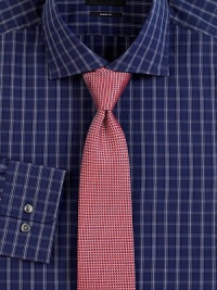 A pattern of tiny dots creates a striped motif across this Italian-crafted silk tie. About 3 wideSilkDry cleanMade in Italy A pattern of tiny dots creates a striped motif across this Italian-crafted silk tie. About 3 wideSilkDry cleanMade in Italy