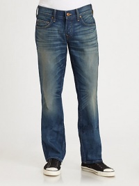 A not-so-basic pair of faded, whiskered denim in a straight-leg style with traditional touches.Five-pocket styleZip flyStitched back pocketsInseam, about 32CottonMachine washMade in USA A not-so-basic pair of faded, whiskered denim in a straight-leg style with traditional touches.Five-pocket styleZip flyStitched back pocketsInseam, about 32CottonMachine washMade in USA