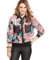 In living color: equipped with lace pockets and a bright, abstract floral print, XOXO's high-low blouse is a pretty pick for the season! In living color: equipped with lace pockets and a bright, abstract floral print, XOXO's high-low blouse is a pretty pick for the season!