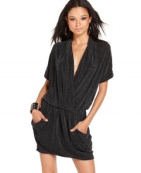 Is it hot in here or is it just this dress!? Baby Phat brings you a spicy short-sleeve dress with dramatic draping with shimmery metallic fabric. Is it hot in here or is it just this dress!? Baby Phat brings you a spicy short-sleeve dress with dramatic draping with shimmery metallic fabric.