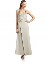 THE LOOKSweetheart necklineFaux patent strapsStructured bodiceBeaded appliqué on bustAsymmetrical mock wrap, front and backSide zip with hook-and-eye closureHorizontal back strapTHE FITAbout 58 from shoulder to hemTHE MATERIALSilkSecond material: 45% spandex/30% polyester/25% cottonSilk liningCARE & ORIGINDry cleanMade in ItalyModel shown is 5'10½ (179cm) wearing US size 4. THE LOOKSweetheart necklineFaux patent strapsStructured bodiceBeaded appliqué on bustAsymmetrical mock wrap, front and backSide zip with hook-and-eye closureHorizontal back strapTHE FITAbout 58 from shoulder to hemTHE MATERIALSilkSecond material: 45% spandex/30% polyester/25% cottonSilk liningCARE & ORIGINDry cleanMade in ItalyModel shown is 5'10½ (179cm) wearing US size 4.