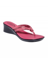 Slick and slip-on. The Blair wedge sandals by Callisto feature a funky knot detail on a printed thong strap. Slick and slip-on. The Blair wedge sandals by Callisto feature a funky knot detail on a printed thong strap.