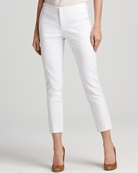 Crisp in white, these Aqua pants boast a high rise that lends itself to a smartly tucked blouse for professional polish. Crisp in white, these Aqua pants boast a high rise that lends itself to a smartly tucked blouse for professional polish.