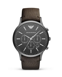 This Emporio Armani piece works hard with a versatile style that goes on-and-off the clock, crafted of a stainless steel case with an embossed leather strap as a classic counterpart. This Emporio Armani piece works hard with a versatile style that goes on-and-off the clock, crafted of a stainless steel case with an embossed leather strap as a classic counterpart.