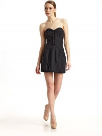 This seamed corset design with an ultra flattering silhouette and intricate piped detailing, is the perfect balance of demure and sassy.Strapless Front hook-and-eye closure Corset seaming Tiered piping at the front Side zip closure Single side boning About 23½ from shoulder to hem Silk lining 55% silk/45% cotton Dry clean Imported This seamed corset design with an ultra flattering silhouette and intricate piped detailing, is the perfect balance of demure and sassy.Strapless Front hook-and-eye closure Corset seaming Tiered piping at the front Side zip closure Single side boning About 23½ from shoulder to hem Silk lining 55% silk/45% cotton Dry clean Imported
