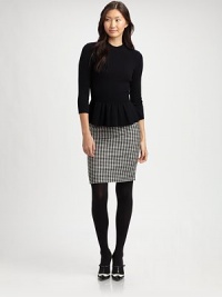 Featuring one of this season's hottest trends, peplum, this wool-blend sweater offers cozy-chic appeal.Mock turtleneckThree-quarter sleevesPeplum hemPull-on styleAbout 24 from shoulder to hem70% wool/20% angora/10% nylonDry cleanImported Model shown is 5'11 (180cm) wearing US size Small. Featuring one of this season's hottest trends, peplum, this wool-blend sweater offers cozy-chic appeal.Mock turtleneckThree-quarter sleevesPeplum hemPull-on styleAbout 24 from shoulder to hem70% wool/20% angora/10% nylonDry cleanImported Model shown is 5'11 (180cm) wearing US size Small.