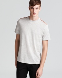 Check shoulder panels demonstrate your taste for high fashion in this super-soft tee from Burberry Brit. Check shoulder panels demonstrate your taste for high fashion in this super-soft tee from Burberry Brit.