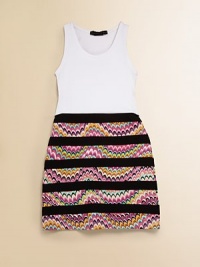 Colorful zig-zag print, contrasting stripes and a tank topper add appeal to this slim-fitting silhouette.ScoopneckSleevelessPullover stylingFitted waist85% rayon/15% spandexHand wash coldImported Colorful zig-zag print, contrasting stripes and a tank topper add appeal to this slim-fitting silhouette.ScoopneckSleevelessPullover stylingFitted waist85% rayon/15% spandexHand wash coldImported