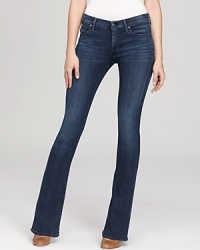The secret's out--Citizens of Humanity Emanuelle Slim Bootcut jeans fit and flatter in all the right places, in a dark wash and five-pocket silhouette. The secret's out--Citizens of Humanity Emanuelle Slim Bootcut jeans fit and flatter in all the right places, in a dark wash and five-pocket silhouette.