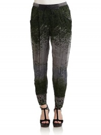 THE LOOKAllover abstract printElastic waist with leather detail and drawstring tieDual besom pocketsBanded zip cuffsTHE FITRise, about 12Inseam, about 26THE MATERIALBody: viscoseSecond fabric: leatherCARE & ORIGINDry cleanImportedModel shown is 5'10½ (179cm) wearing US size Small. THE LOOKAllover abstract printElastic waist with leather detail and drawstring tieDual besom pocketsBanded zip cuffsTHE FITRise, about 12Inseam, about 26THE MATERIALBody: viscoseSecond fabric: leatherCARE & ORIGINDry cleanImportedModel shown is 5'10½ (179cm) wearing US size Small.