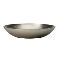 Organically molded under fire, this handmade bowl exudes metal artistry with a New York edge. Organically molded under fire, this handmade bowl exudes metal artistry with a New York edge.