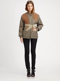 Channel the runway in this quilted coat with contrasting suede trim and a detachable corset panel for a dose of countryside-cool. Ribbed asymmetrical collarAsymmetrical zipperDetachable crossover panelLong sleevesRibbed cuffs and hemFully linedAbout 27 from shoulder to hemBody: 100% nylonTrim: Cotton/acrylic/suedeDry clean with leather specialistImportedModel shown is 5'10 (177cm) wearing US size 4. 