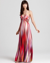 A streaky print of vibrant color enlivens this Sky maxi dress, cut in a halter silhouette with intricately braided details. A streaky print of vibrant color enlivens this Sky maxi dress, cut in a halter silhouette with intricately braided details.