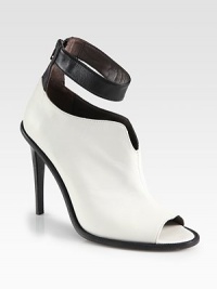 An ankle strap puts a modern spin on this sculpted two-tone leather design, with a sexy open toe and towering heel. Stacked heel, 4¾ (120mm)Leather upperOpen toeBack zipLeather lining and solePadded insoleMade in Italy An ankle strap puts a modern spin on this sculpted two-tone leather design, with a sexy open toe and towering heel. Stacked heel, 4¾ (120mm)Leather upperOpen toeBack zipLeather lining and solePadded insoleMade in Italy