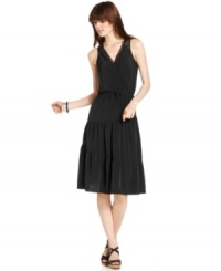 The little black dress gets a boho touch with an easy fit and tiered skirt in this look from DKNY Jeans. The little black dress gets a boho touch with an easy fit and tiered skirt in this look from DKNY Jeans.