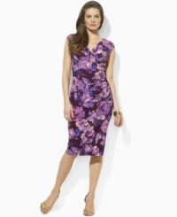 Crafted with a stunning V-neckline and flattering ruched detailing, Lauren by Ralph Lauren's chic floral dress is the epitome of elegance and effortless style in fluid, body-skimming matte jersey. Crafted with a stunning V-neckline and flattering ruched detailing, Lauren by Ralph Lauren's chic floral dress is the epitome of elegance and effortless style in fluid, body-skimming matte jersey.