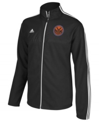 Take your best shot and support your favorite NBA basketball team with this New York Knicks jacket from adidas. Take your best shot and support your favorite NBA basketball team with this New York Knicks jacket from adidas.