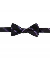 Put a twist on the standard with this striped bow tie from DKNY. Put a twist on the standard with this striped bow tie from DKNY.