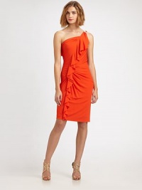 This playful, vibrantly-hued style features a gold accent at the shoulder and a ruffled front drape.Asymmetrical necklineGold shoulder detailRuffled front drapeFully linedAbout 22 from natural waistRayonDry cleanMade in USA of imported fabric This playful, vibrantly-hued style features a gold accent at the shoulder and a ruffled front drape.Asymmetrical necklineGold shoulder detailRuffled front drapeFully linedAbout 22 from natural waistRayonDry cleanMade in USA of imported fabric