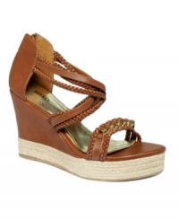 What's not to love? XOXO weaves edgy, metal chains through the braided straps of the espadrille-trimmed Flora wedges. What's not to love? XOXO weaves edgy, metal chains through the braided straps of the espadrille-trimmed Flora wedges.