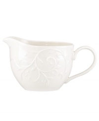 With an elegant white-on-white pattern featuring an embossed vine motif and radiant glaze, the Opal Innocence Carved gravy boat gets your table set for refined dining every day. With an elegant white-on-white pattern featuring an embossed vine motif and radiant glaze, the Opal Innocence Carved gravy boat gets your table set for refined dining every day.