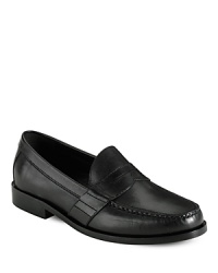 Slide into these extra supportive penny loafers from Cole Haan for a full day and night of comfort and classic style. Featuring concealed Nike Air technology in the heel, they give you their full support whether you're shuffling to work or just walking off a big dinner in Little Italy. Slide into these extra supportive penny loafers from Cole Haan for a full day and night of comfort and classic style. Featuring concealed Nike Air technology in the heel, they give you their full support whether you're shuffling to work or just walking off a big dinner in Little Italy.