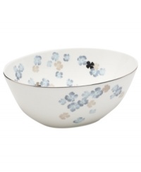 Breezy florals scatter on the white bone china of this Water Blossoms vegetable bowl, suffusing your table with effortless grace. With shimmering platinum petals and banding for an especially pretty table. From Martha Stewart Collection. Breezy florals scatter on the white bone china of this Water Blossoms vegetable bowl, suffusing your table with effortless grace. With shimmering platinum petals and banding for an especially pretty table. From Martha Stewart Collection.