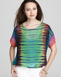 A rainbow of color splashes the relaxed silhouette of this VINCE CAMUTO sheer blouse, the perfect partner to slim jeans.