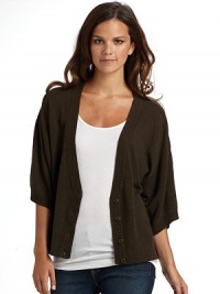 THE LOOKFour-button front closureThree-quarter sleeves with ribbed cuffsRuched detail at backTHE FITAbout 23½ from shoulder to hemTHE MATERIAL55% silk/45% cashmereCARE & ORIGINDry cleanImported THE LOOKFour-button front closureThree-quarter sleeves with ribbed cuffsRuched detail at backTHE FITAbout 23½ from shoulder to hemTHE MATERIAL55% silk/45% cashmereCARE & ORIGINDry cleanImported