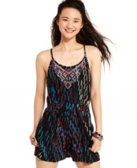 Tribal-inspired embroidery is superimposed over a rich, contrasting print on the perfect, hot-weather romper from Angie! Tribal-inspired embroidery is superimposed over a rich, contrasting print on the perfect, hot-weather romper from Angie!