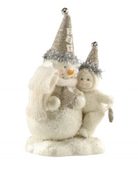 Crafted of pure bisque porcelain, this precious figurine is hand-painted and continues the Snowbabies tradition of lasting childhood innocence and joy. Fine details of sparkling silver and gold enhance its lasting beauty. Crafted of pure bisque porcelain, this precious figurine is hand-painted and continues the Snowbabies tradition of lasting childhood innocence and joy. Fine details of sparkling silver and gold enhance its lasting beauty.