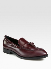 Front tassels and kiltie trim add moccasin inspiration to these glossy, Italian leather loafers. Leather upperLeather liningPadded insoleRubber soleMade in Italy Front tassels and kiltie trim add moccasin inspiration to these glossy, Italian leather loafers. Leather upperLeather liningPadded insoleRubber soleMade in Italy