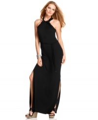 T Tahari's petite maxi dress goes for extreme elegance with its flowing silhouette, accentuated by two sexy slits that run to the thigh to show off your legs and a pair of must-be-seen wedges. T Tahari's petite maxi dress goes for extreme elegance with its flowing silhouette, accentuated by two sexy slits that run to the thigh to show off your legs and a pair of must-be-seen wedges.