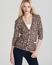 This lively layering MARC BY MARC JACOBS cardigan features mini loops in multiple hues offset by ruby-toned buttons and a creamy white trim. This lively layering MARC BY MARC JACOBS cardigan features mini loops in multiple hues offset by ruby-toned buttons and a creamy white trim.