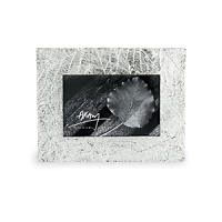 Michael Aram finds inspiration from nature for many of his handcrafted metalware pieces. The Forest Leaf frames are in tarnish resistant silverplate. Michael Aram finds inspiration from nature for many of his handcrafted metalware pieces. The Forest Leaf frames are in tarnish resistant silverplate.