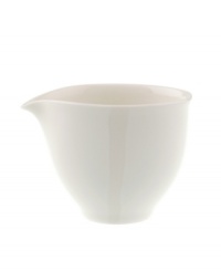 Make a chic style statement with the Dune Lines creamer. The distinctive, free form shape, soft lines and ribbed surface combine for truly modern elegance. An imperfect glaze conveys natural grace. Make a chic style statement with the Dune Lines creamer. The distinctive, free form shape, soft lines and ribbed surface combine for truly modern elegance. An imperfect glaze conveys natural grace.